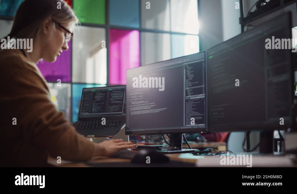 Female Developer Codes on Desktop Computer in Office Stock Video ...