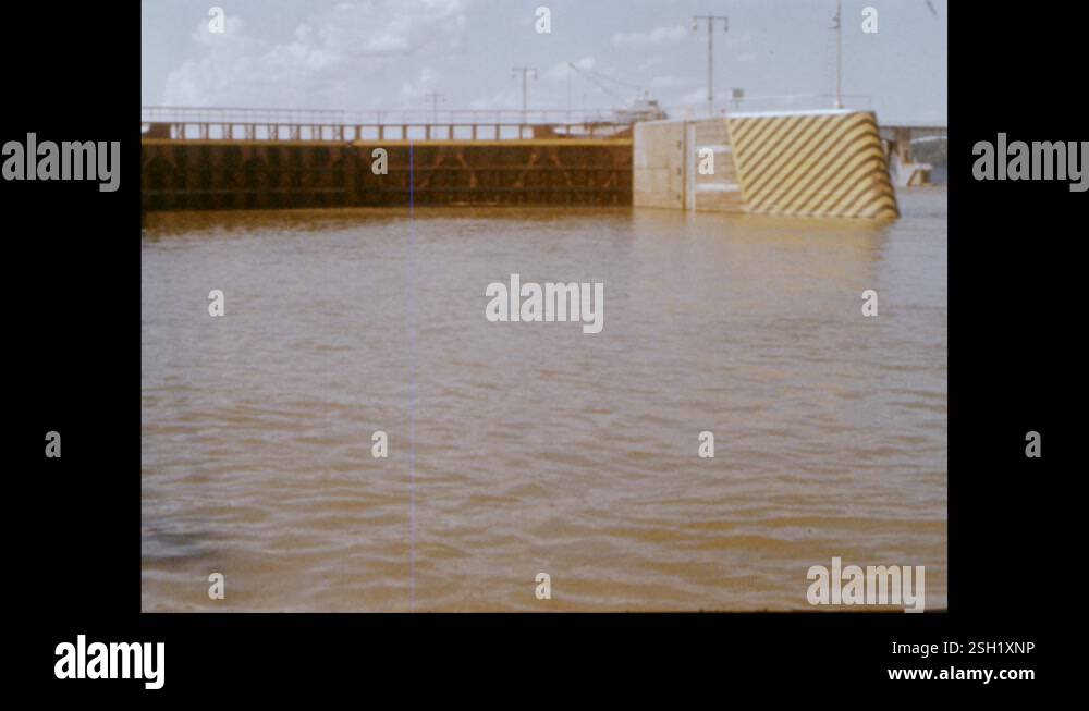 1940s: River with dam and gate and channel. Lake inlet Stock Video ...