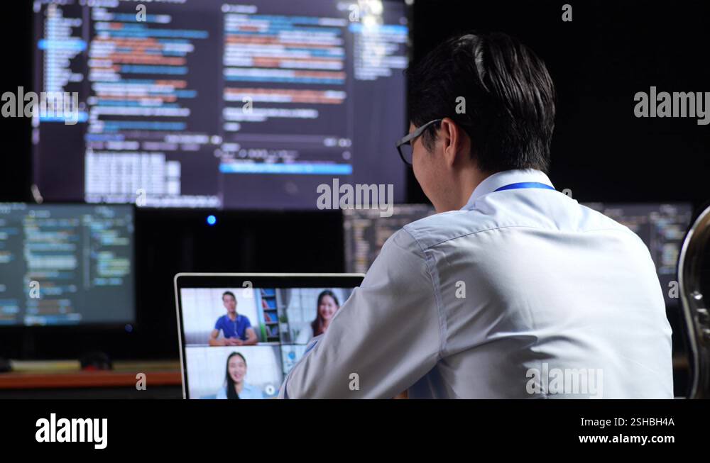 Close Up Back View Of Asian Male Programmer Having A Meeting By A ...