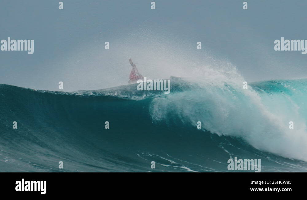 View of Surfer rides the big wave in the Maldives, Sultans surf spot during big ...