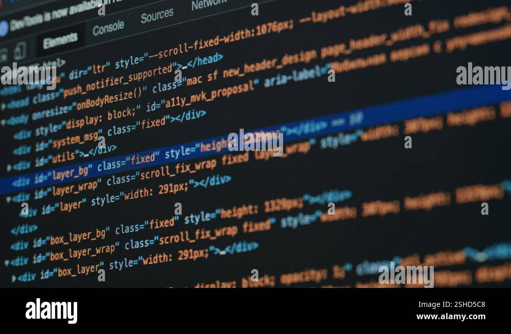 Coding UX UI script text on screen, HTML5 in editor for website ...