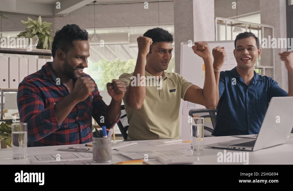 Software Developers Celebrating Successful Project in Office Stock ...