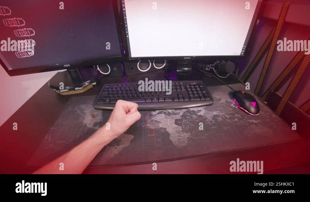 POV hungry man while working on computer touches his belly stomach ache ...