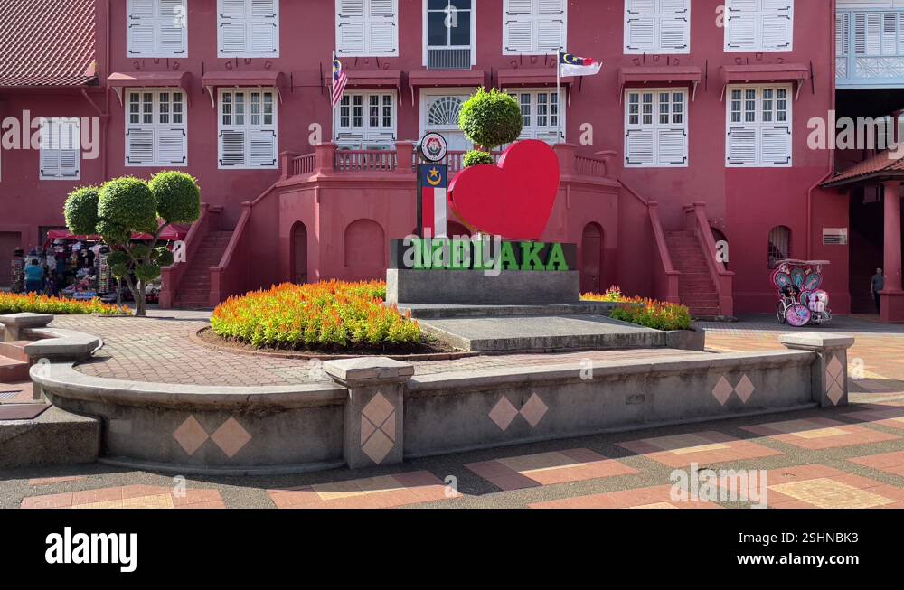 Iconic historic Dutch Square against maroon-coloured structures in the ...