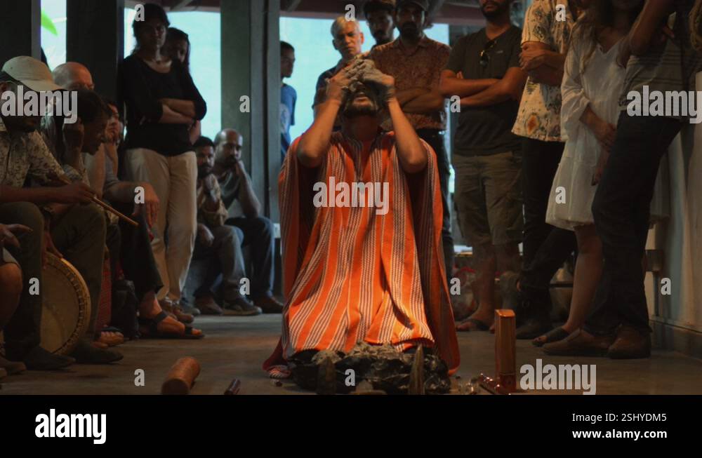 Shamnan Ritual South American Shaman Performs Ritual on a religious day and apply mud ...