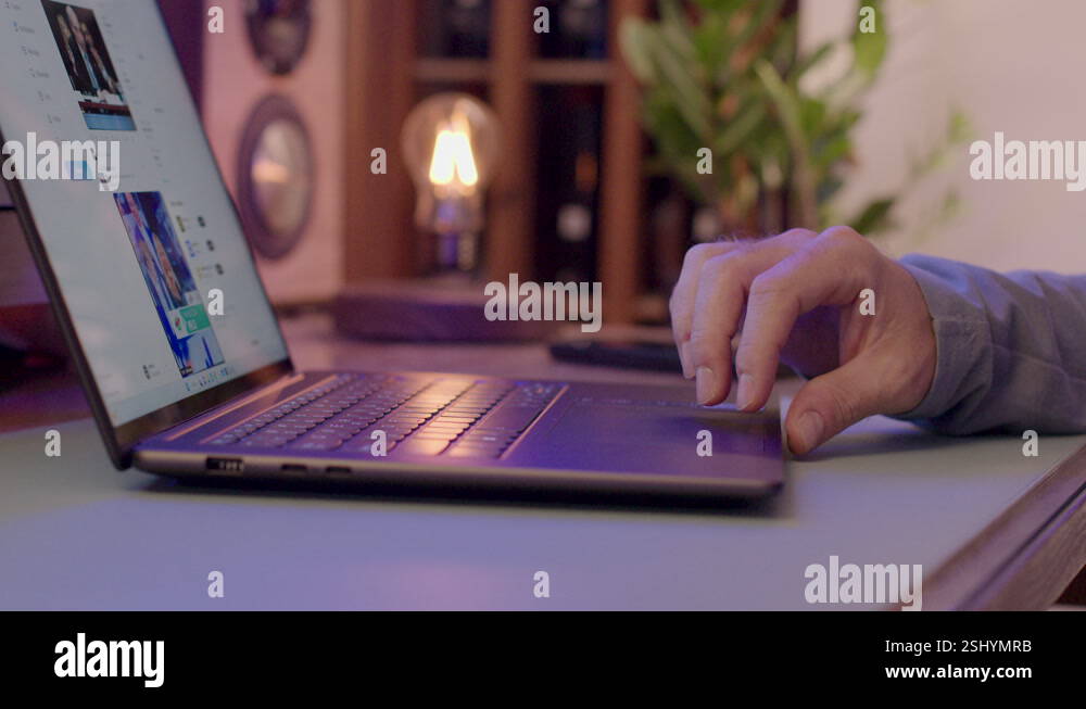 Man's Hand Browsing And Scrolling Social Media Through Laptop Computer ...