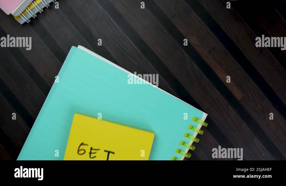 Concept of Get Lost write on sticky notes isolated on Wooden Table ...