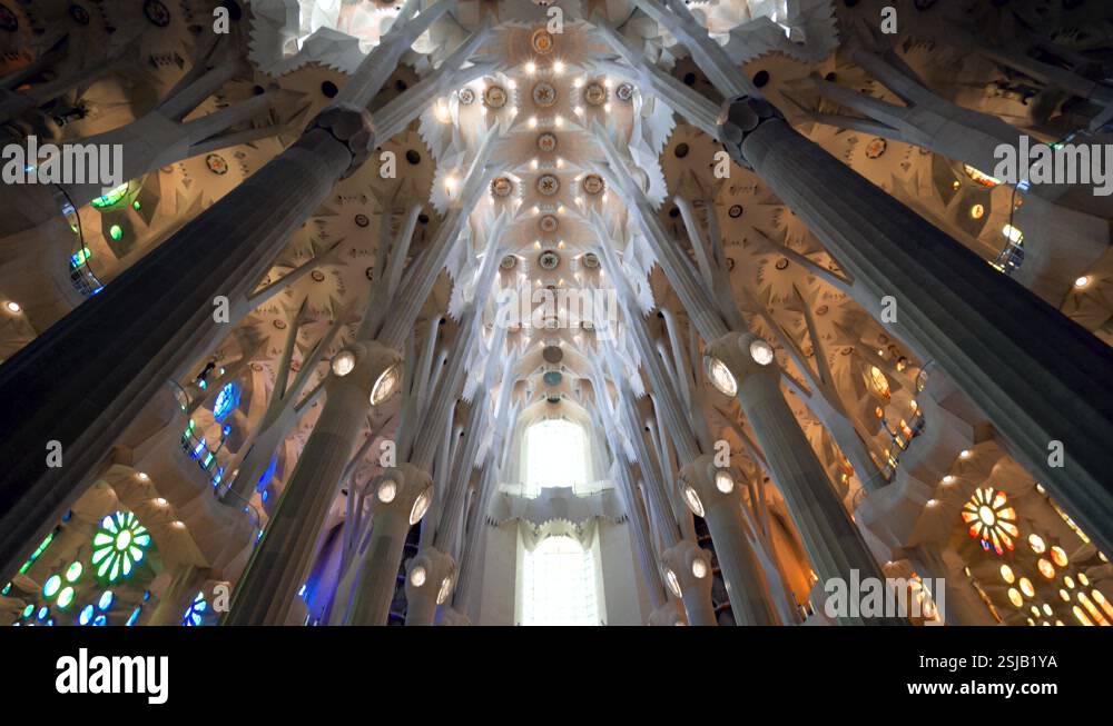 Ceiling Interior of the Sagrada Familia in Barcelona Spain; up tilting ...