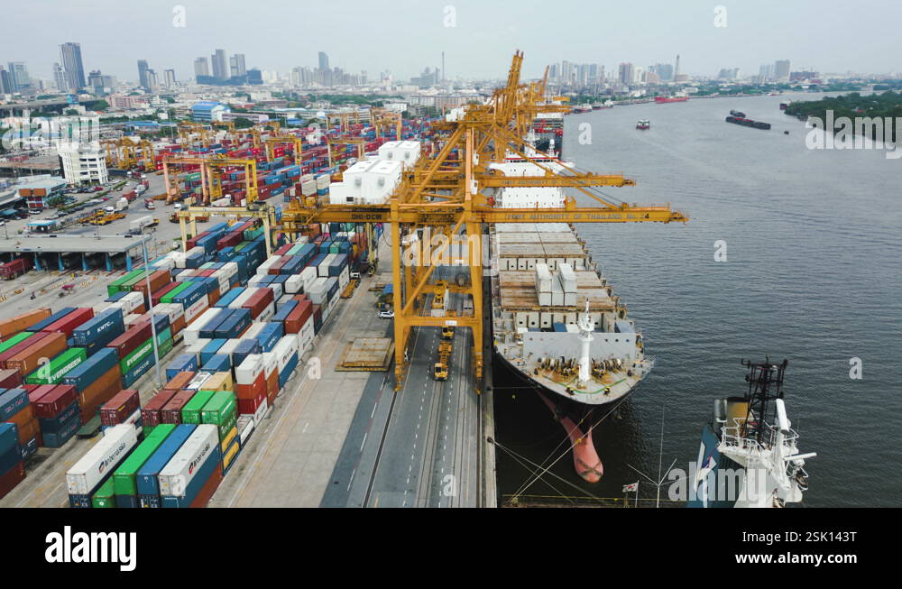 Shipping Container Traffic Shipping port, cargo container ship, crane, and car traffic transport ...