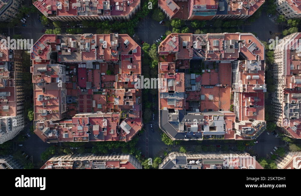 Birds eye view of streets and buildings in city. Residential blocks in ...