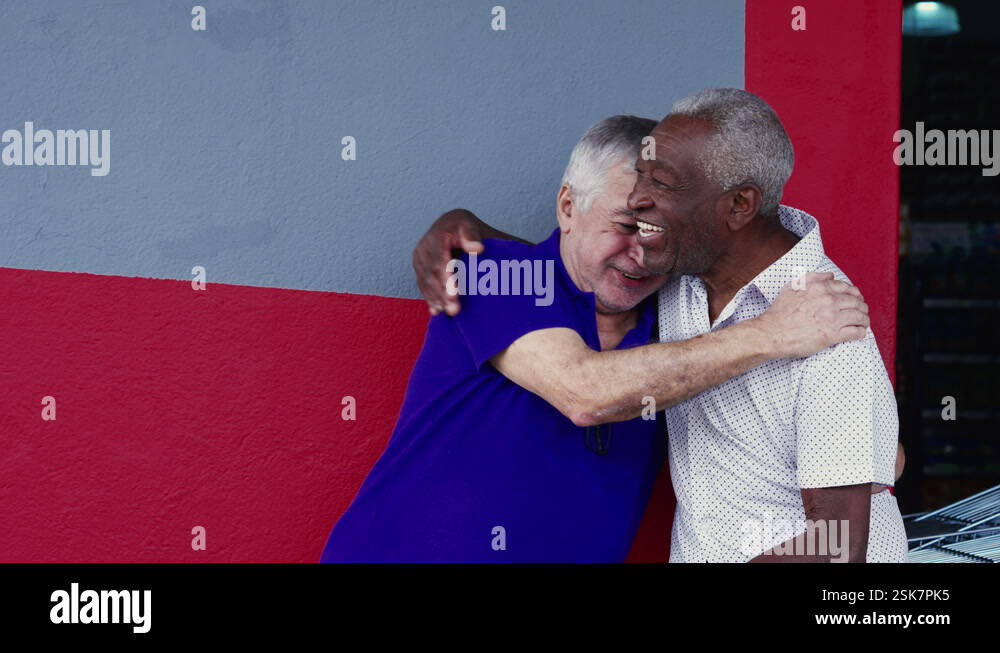 Authentic Friends Authentic Interaction of Two Happy Diverse Older Friends, Hugging and ...