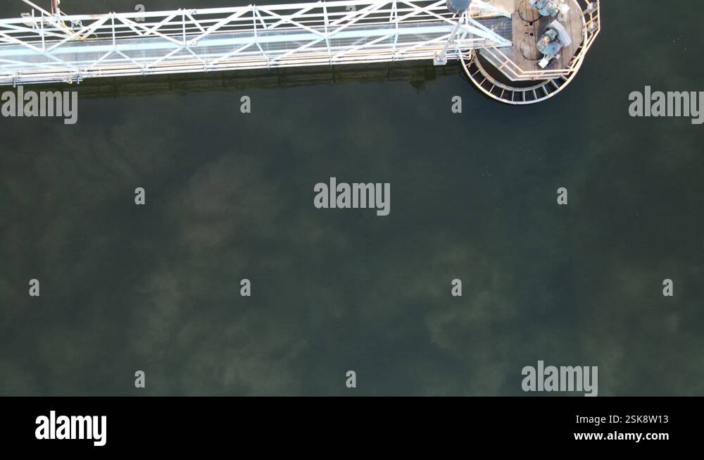 Aerial top down Close up view of the clarifier with the sludge visible ...