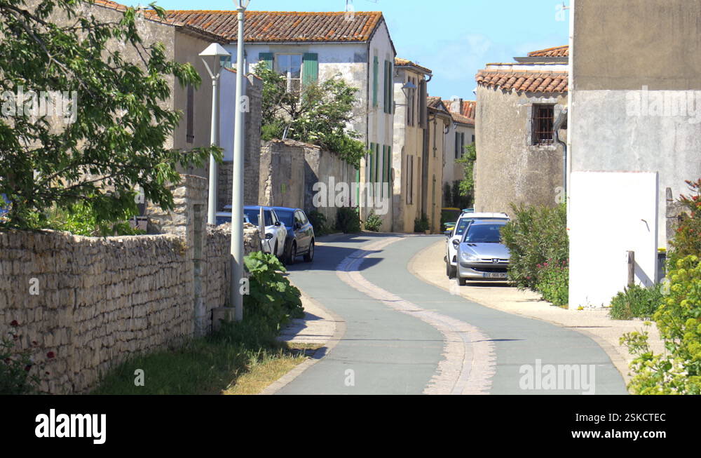 Narrow street of Sainte-Marie-de-Ré, France on the Ile de Ré Stock ...