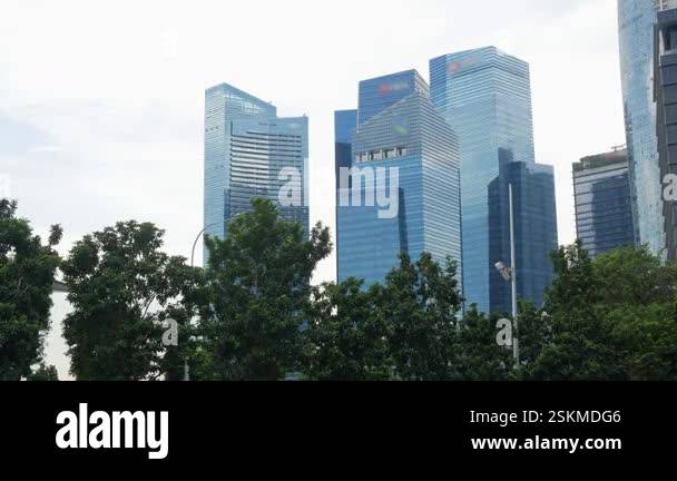 Look up to modern office high rise skyscraper financial buildings in ...