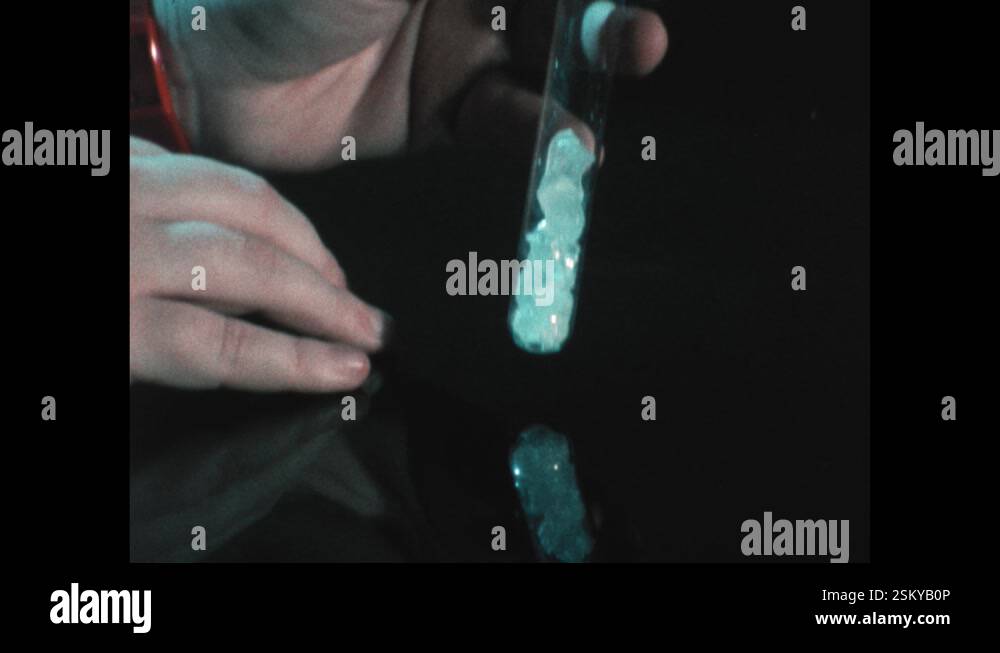 1980s: Vial of crack cocaine. Boy taps crack rocks into glass pipe ...