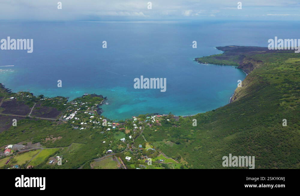 Cinematic aerial overview of tropical coastline in Big Island in Hawaii ...