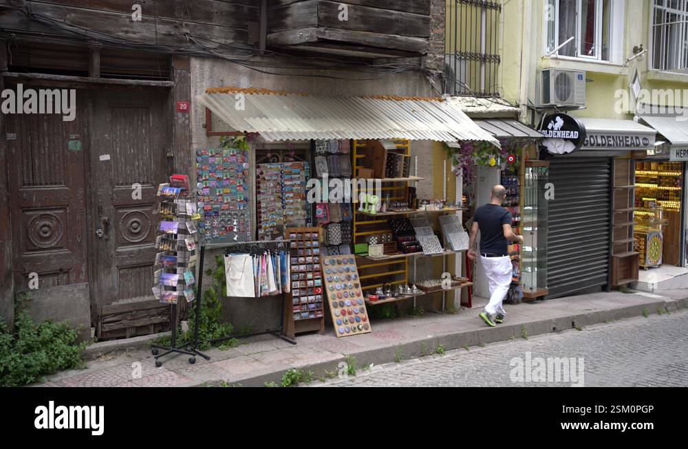 Turkish Shopkeeper Shopkeeper setting up his souvenir shop in Istanbul, Turkey Stock Video ...