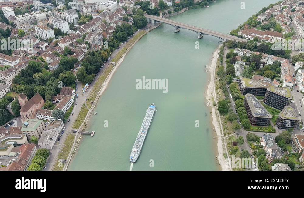 Basel, Switzerland. A tanker cargo barge floats along the Rhine River ...