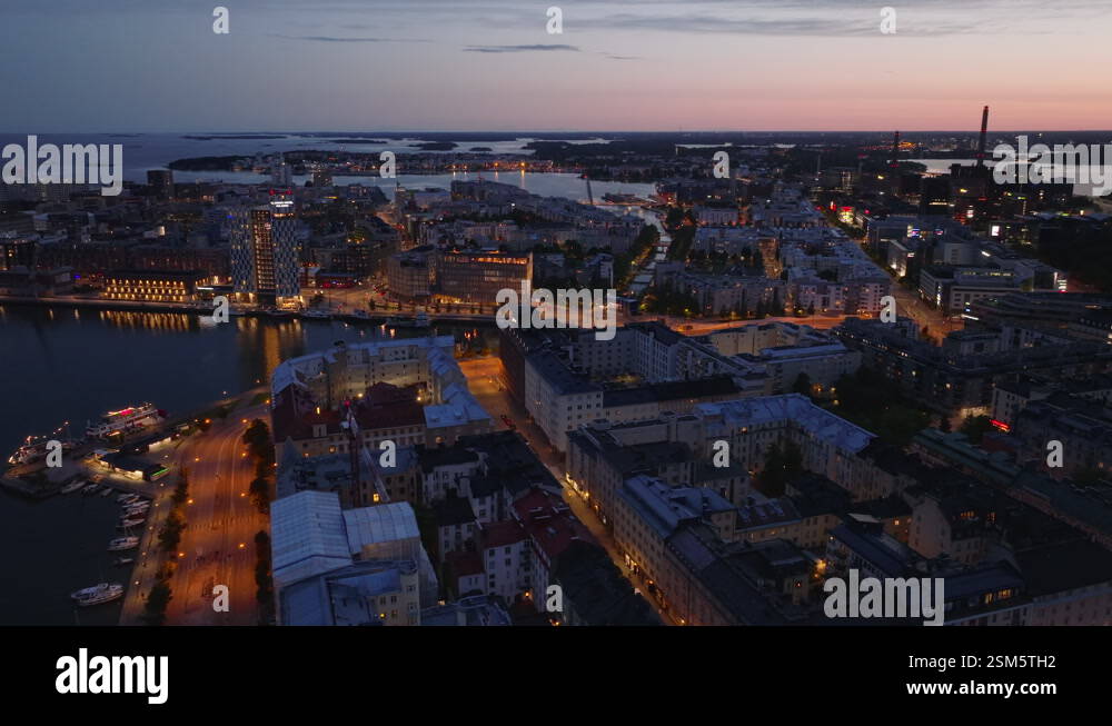 Aerial view of town development in urban borough at dusk. Modern ...