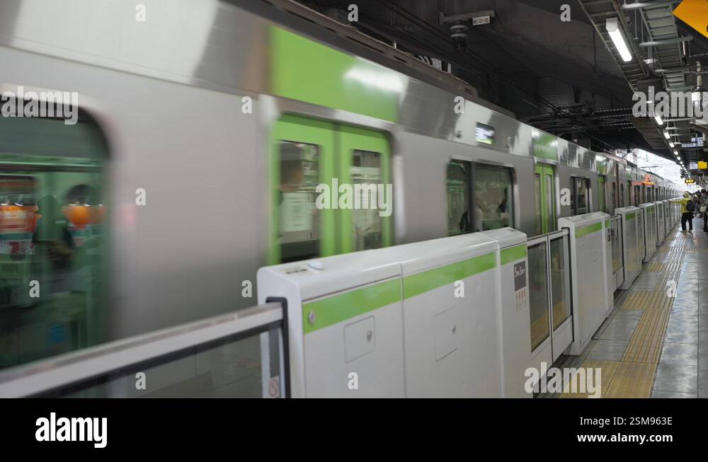 Jr Metro Ride JR train Chiyoda line arriving at the station platform. Tokyo metro ...