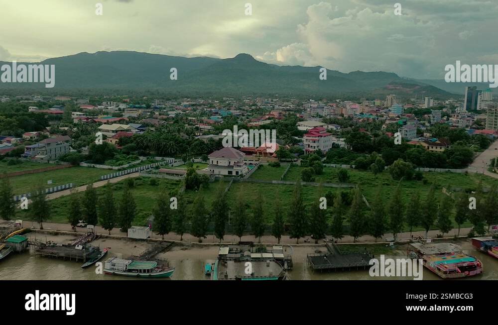 Kompot View drone view of river boats and the buildings in Kampot Province ...