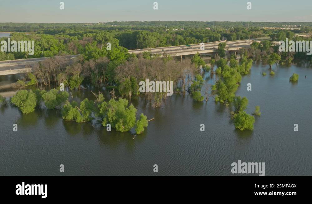 4K CCW Orbiting Drone Shot Of Submerged Trees In Flooded Fisher Lake ...