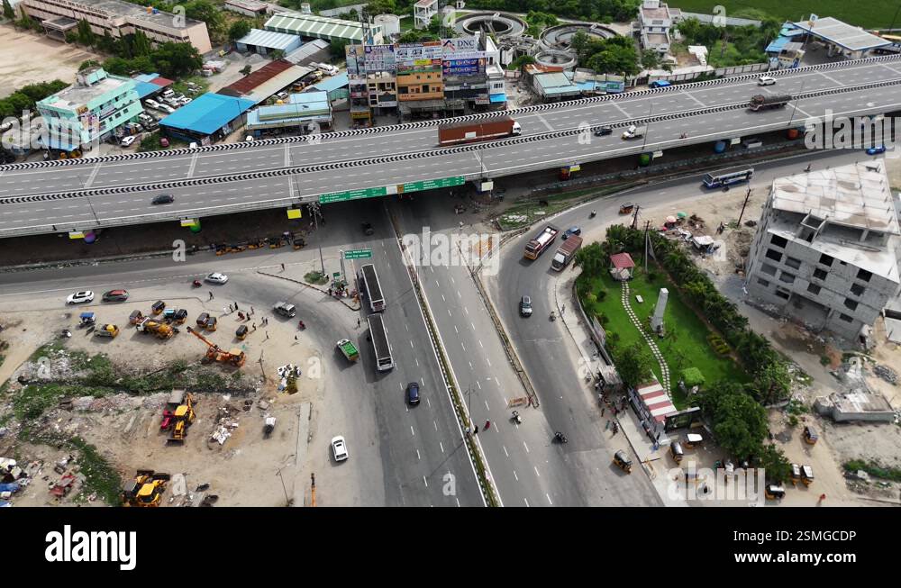 Chennai, India - 07/14/2024: Elevated footage of a busy intersection ...