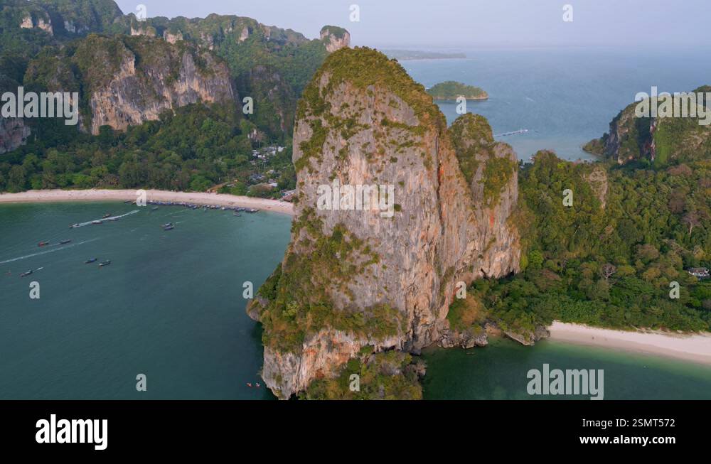 Aerial footage of huge limestone rocks at Railay beach in Thailand ...