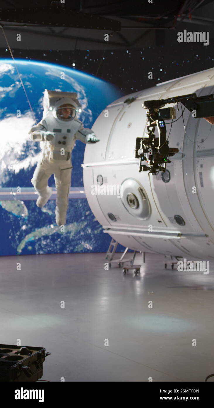 Vertical Screen Virtual Production Studio Shooting a Space Movie Stock ...