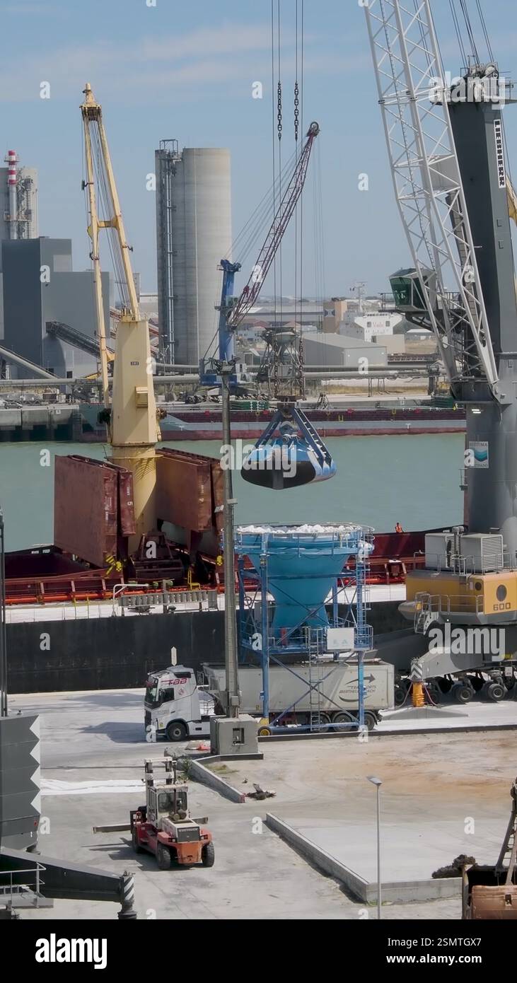 A Crane Unloading Aggregate into a Funnel and into a Lorry Stock Video ...