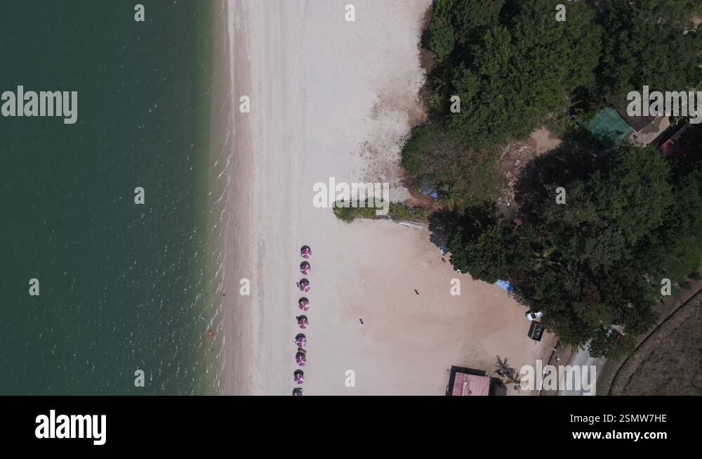 Parasols at Sand beach Rekreasi Kastam with turquoise water on Langkawi ...