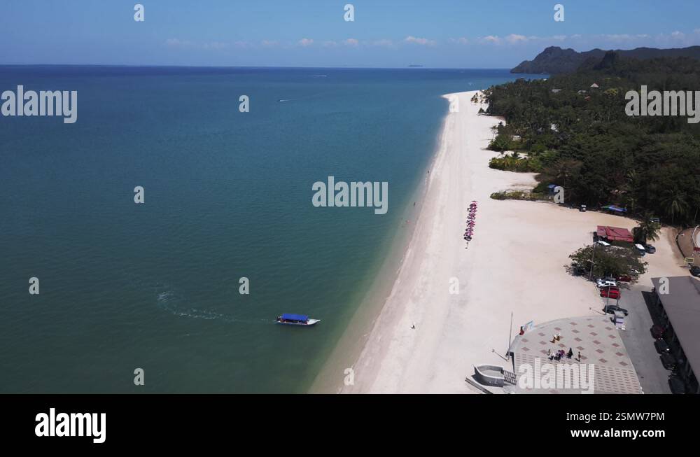 parasols on Sand beach Rekreasi Kastam with turquoise water on Langkawi ...
