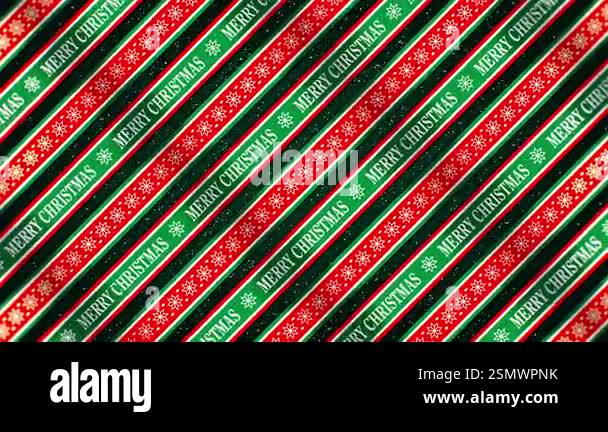 Merry Christmas text on ribbons scrolling across the screen zooming in ...