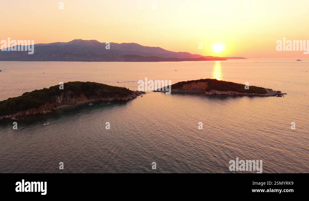 Ksamil Islands At Sunset With The Sun Setting Behind The Mountains Ksamil Islands At Sunset With The Sun Setting Behind The Mountains