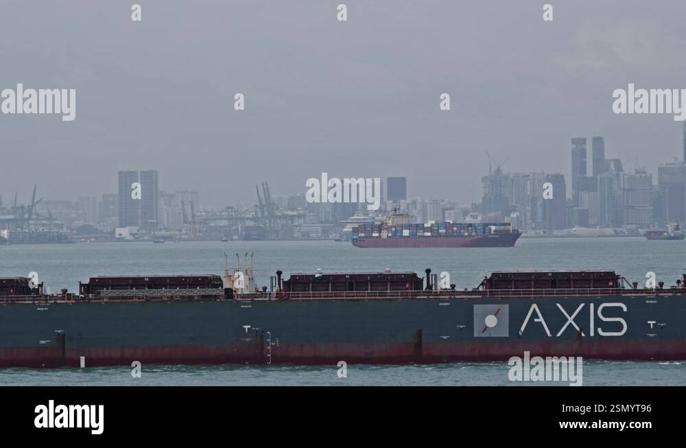 Singapore, Singapore - 09/06/2024: Container ship sailing in Singapore ...