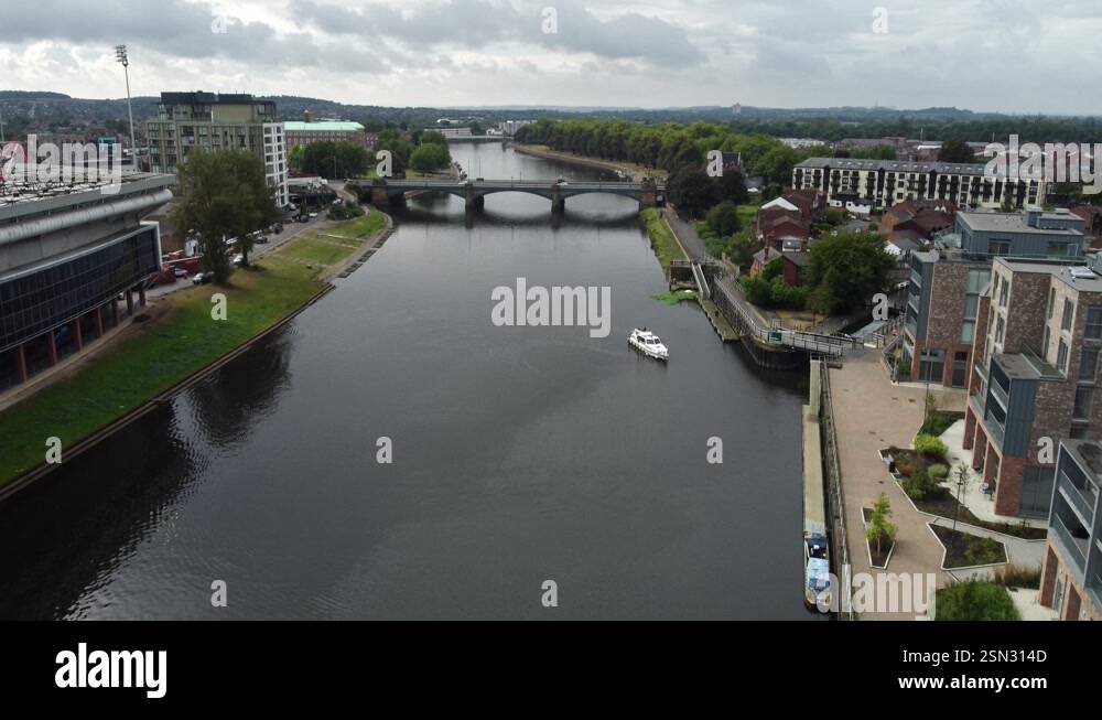 A Single river boat heading towards a mooring on the River Trent in ...