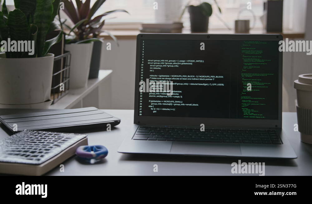 Laptop with Computer Code on Desk of IT Engineer in Office Stock Video ...