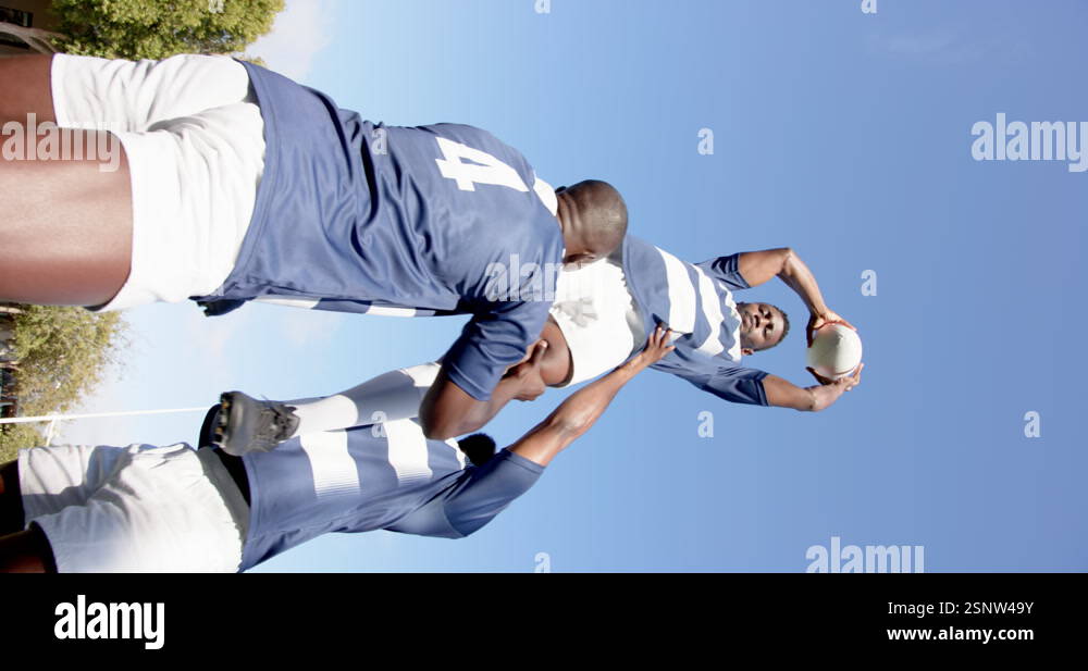 Vertical video: Rugby players lifting teammate during lineout, teamwork ...