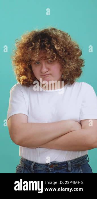 Vertical video. Offended expression. Grumpy face. Body shaming ...