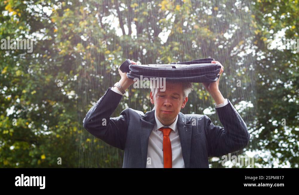 Why is it raining on me - sad businessman caught out in the rain Stock ...
