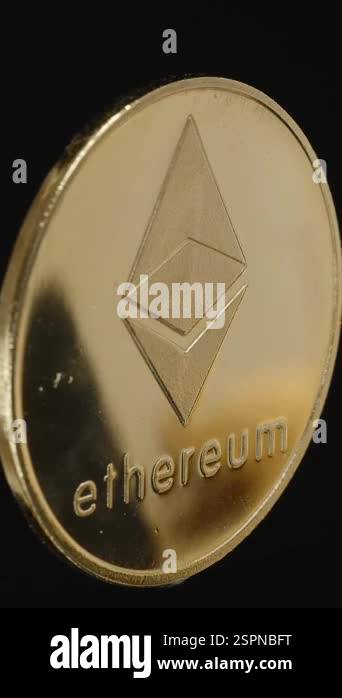 Coin Loop Vertical video. Ethereum Coin Rotating Smoothly in a Continuous Loop ...