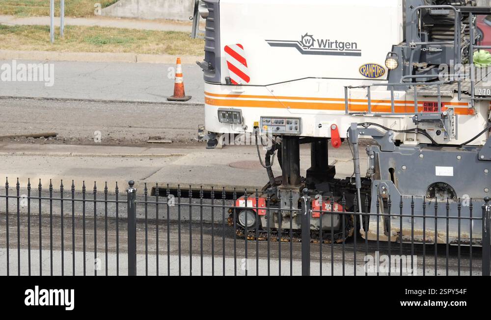 Engineer Ripping Up Heavy machinery ripping up Asphalt road resurfacing Stock Video Footage ...