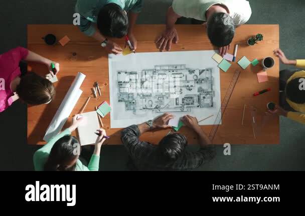 Top view of civil engineer writing and planning by using sticky notes ...