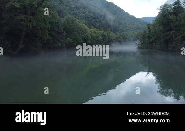 River Roding Scary Drone view video of scary spooky river of Kolpa on a gray dull summer ...