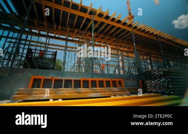Working process at a construction site. Workers make a reinforced ...