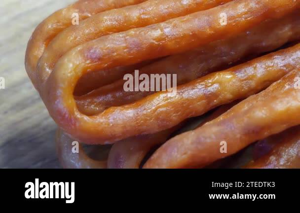 Traditional Polish sausages kabanosy, close-up video. Chicken sausages ...