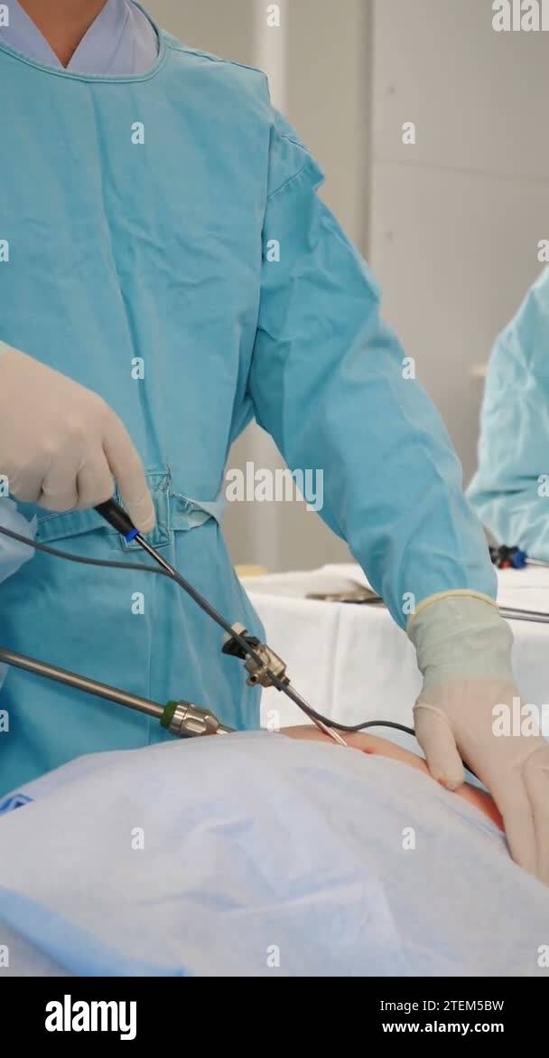 Surgical laparoscopic operation in clinic. Nurse in operating room