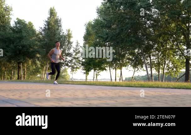 Sporty man running in park Stock Videos & Footage - HD and 4K Video ...