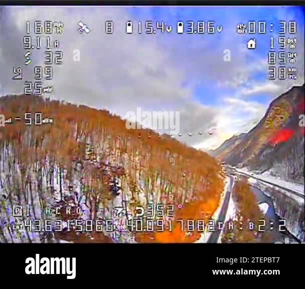 Digital crash effect on the camera from a drone with a view of green ...