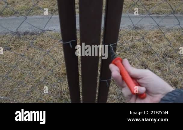 Wire Video Wire mesh gate Stock Videos & Footage - HD and 4K Video Clips - Alamy